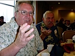 Greg Huckabey, with Ralph Draeger in the 
background