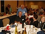 Joe Wozniak sitting, with G. Meredith Musick standing behind him