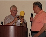 Jack Sanders passing the proverbial torch to Tom Bernard