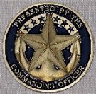 Front side of a coin that Mike Elliot gave to 4 Association Members