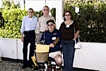 Al Paston, Bill Mitchell, Lance Wallin <i>(sitting)</i> with wife Karen
