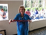 Pat Turley, ready to use the whip she received at the 2006 Reunion on the nagmaster at a moments notice