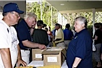 Bob Sheard & Jack Turley checking in Sharon Bailey