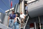 Jim & Bev Kelly & Ron Winde coming down the ladder from the Signal bridge