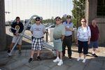 Jordan & Cal deKnniker, Ron Able, Bob Hillman, Ann Able & Lefty Millman waiting at gate to get into the Boston Naval Yard