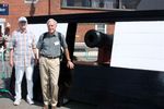 Eph Holmes & Lee Baly standing beside USS Constitution battery